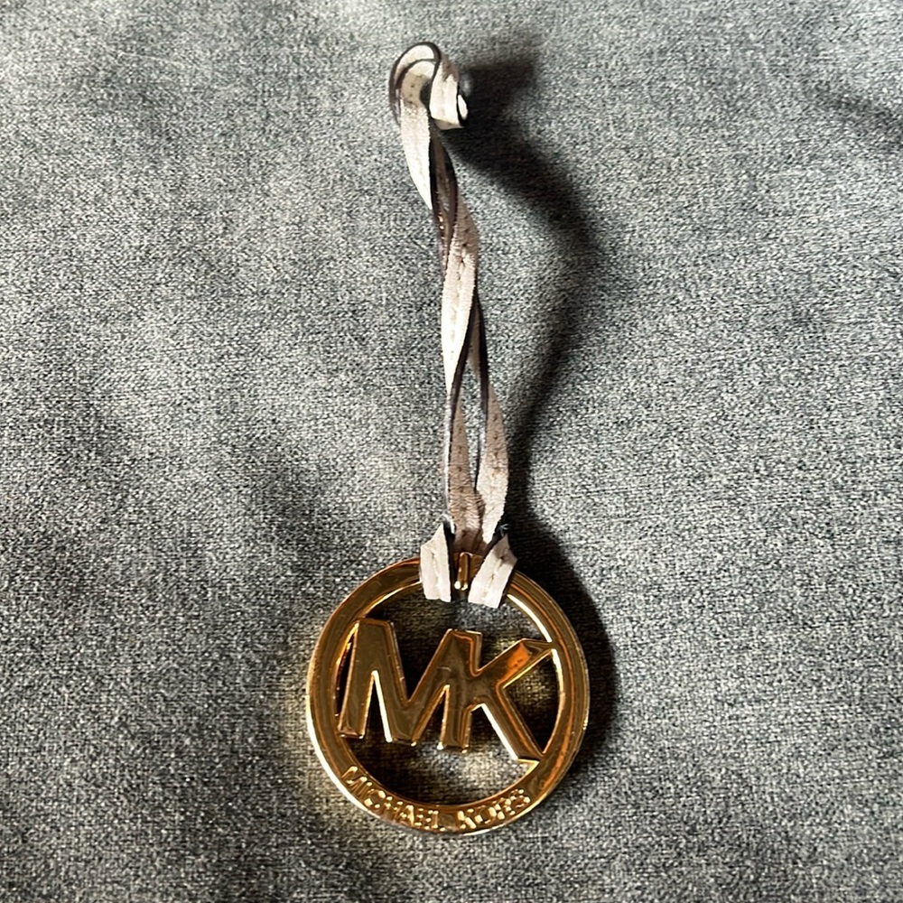 MK bag tag